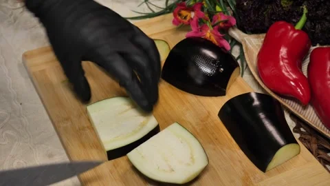 Preparing Fragrant Eggplants for Delicious Home Cooking Stock Footage 311894496