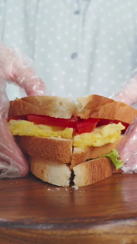 Preparing a Fresh Breakfast Sandwich Stock Footage 290105270
