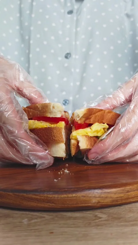 Preparing a Fresh Breakfast Sandwich Stock Footage 290105403