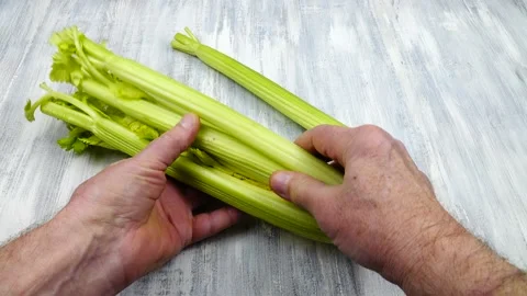 Preparing fresh celery stalks for cooking Stock Footage 171086527