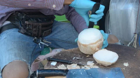 Preparing a fresh coconut. Stock Footage 61442512