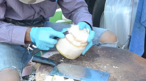 Preparing a fresh coconut. Stock Footage 61445232
