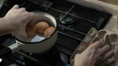 Preparing Fresh Eggs for Delicious Cooking Stock Footage 303975730