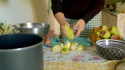 Preparing Fresh Fruit in the Kitchen for Delicious and Nutritious Dishes Stock Footage 318922369