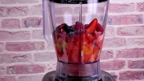 Preparing fresh fruit smoothie in blender 스톡 동영상 197623748