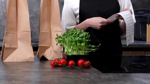 Preparing fresh ingredients at a cozy kitchen counter Stock-Footage 296315431