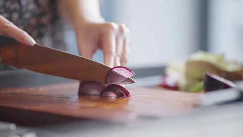 Preparing fresh ingredients on a kitchen cutting board Stock Footage 336466257