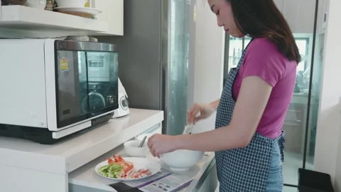 Preparing Fresh Ingredients in the Kitchen Stock Footage 314450840