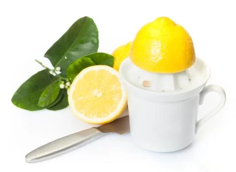 Preparing fresh lemon juice Stock Photos