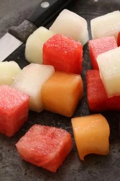 Preparing fresh melon Stock Photos