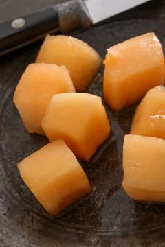 Preparing fresh melon Stock Photos