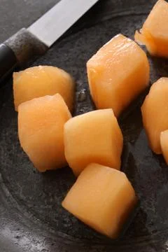 Preparing fresh melon Stock Photos