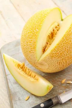Preparing fresh melon Stock Photos