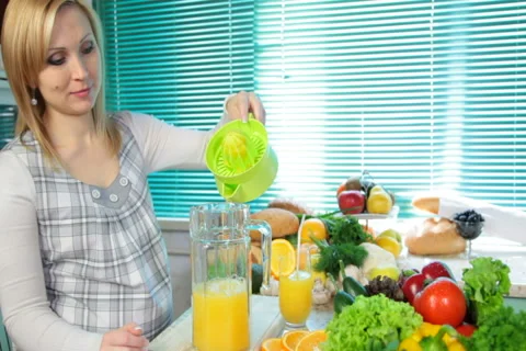 Preparing of fresh orange juice Stock Footage