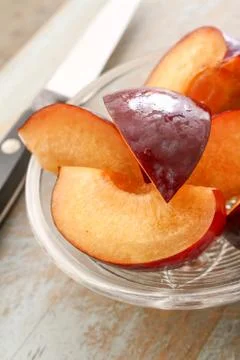 Preparing fresh plums Stock Photos