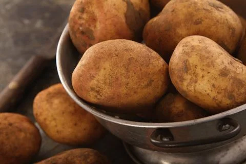 Preparing fresh potatoes Stock Photos