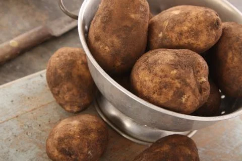 Preparing fresh potatoes Stock Photos