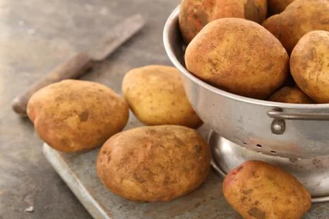 Preparing fresh potatoes Stock Photos