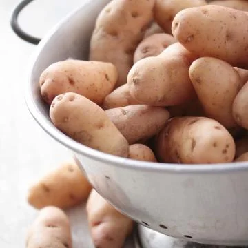 Preparing fresh potatoes Stock Photos