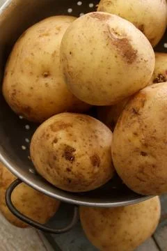 Preparing fresh potatoes Stock Photos