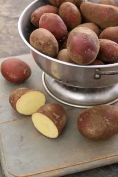 Preparing fresh potatoes Stock Photos