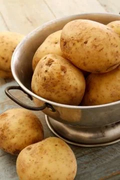Preparing fresh potatoes Stock Photos
