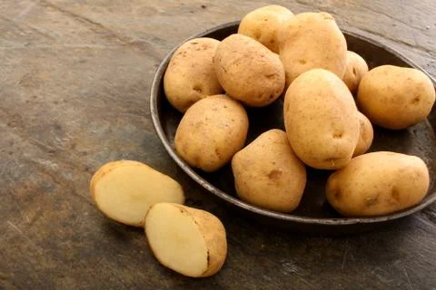 Preparing fresh potatoes Stock Photos