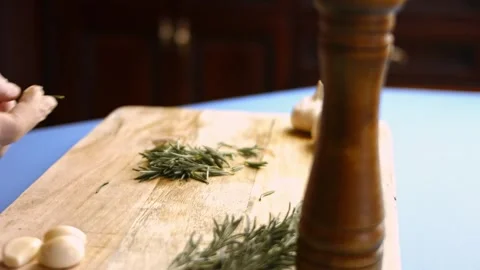 Preparing Fresh Rosemary and Garlic for Cooking Stock Footage 301953953