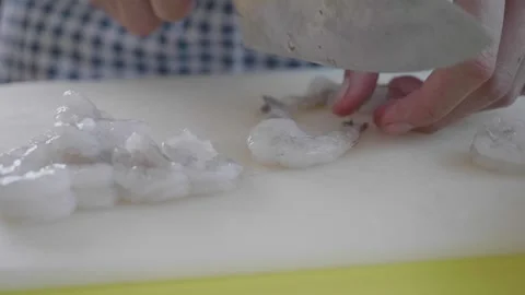 Preparing Fresh Shrimp for Cooking Stock Footage 313830007