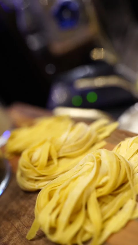 Preparing Fresh Spaghetti Pasta at Casino Weekend Event Stock Footage 294807442