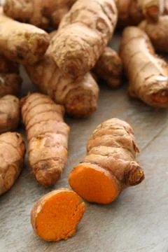 Preparing fresh turmeric root Stock Photos