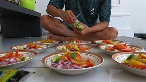 Preparing fresh vegetable salads, satay seasoning Stock-Footage 279445510