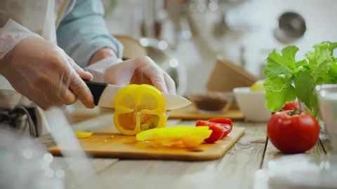 Preparing fresh vegetables for a healthy meal in a modern kitchen Stock Footage 293732826