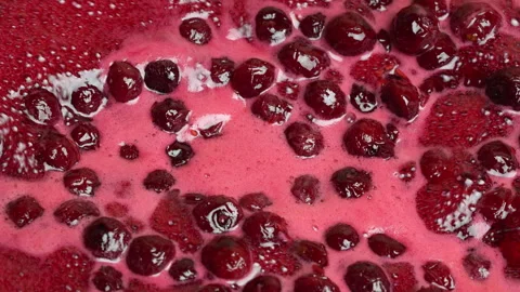 Preparing freshly picked red cherries with sugar to make cherry jam in saucepan Stock Footage 313474066