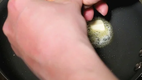 Preparing Fried Egg Stock Footage 103745951