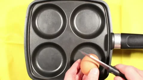 Preparing fried eggs Stock-Footage 10825291