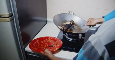 Preparing fried fish Video stock 141186147