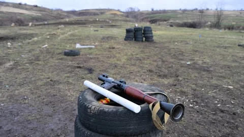 Preparing for frontline combat: An RPG-7 anti-tank rocket launcher at a Ukraine Stock Footage 313671056