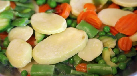 Preparing frozen vegetable mix Stock Footage 37528171