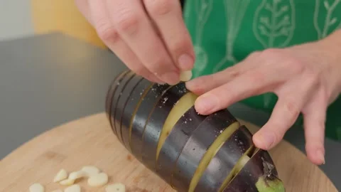 Preparing Garlic and Root Vegetable Slices in Cooking Kitchen Video stock 341461905
