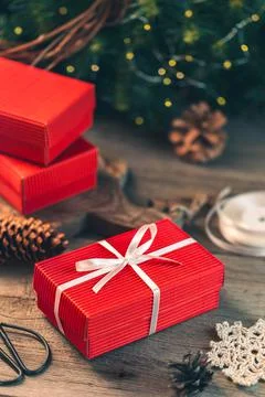 Preparing gift boxes with ribbon for xmas presents Stock Photos