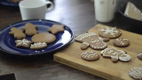Preparing gingerbread cookies and cupcake for Christmas celebration. 스톡 동영상 83081938