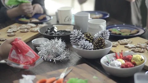 Preparing gingerbread cookies and cupcake for Christmas celebration. Stock Footage 83081951