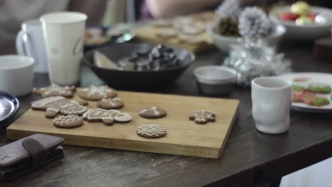 Preparing gingerbread cookies and cupcake for Christmas celebration. Stock-Footage 83081966