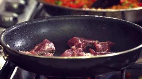 Preparing gourmet dish by browning meat Stock Footage 70725862