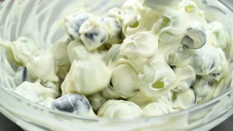 Preparing grape salad with yogurt. Stock Footage 170903100
