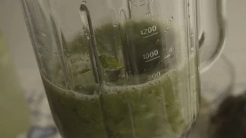 Preparing green juice Stock Footage 86153640