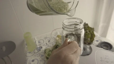 Preparing green juice Stock Footage 86153860
