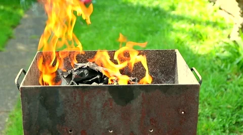 Preparing the grill for a barbecue Stock Footage 49006073