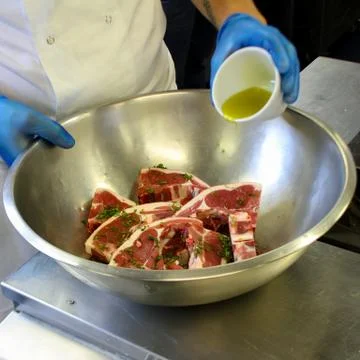 Preparing grilled lamb chops Stock Photos
